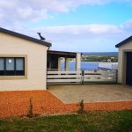 Fish and Go Accommodation, parking to side of house